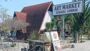 Een gebouw met een bord waarop staat: Art Market Senggigi Lombok.