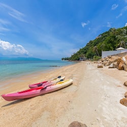 On the beach, sun loungers, beach umbrellas, beach towels