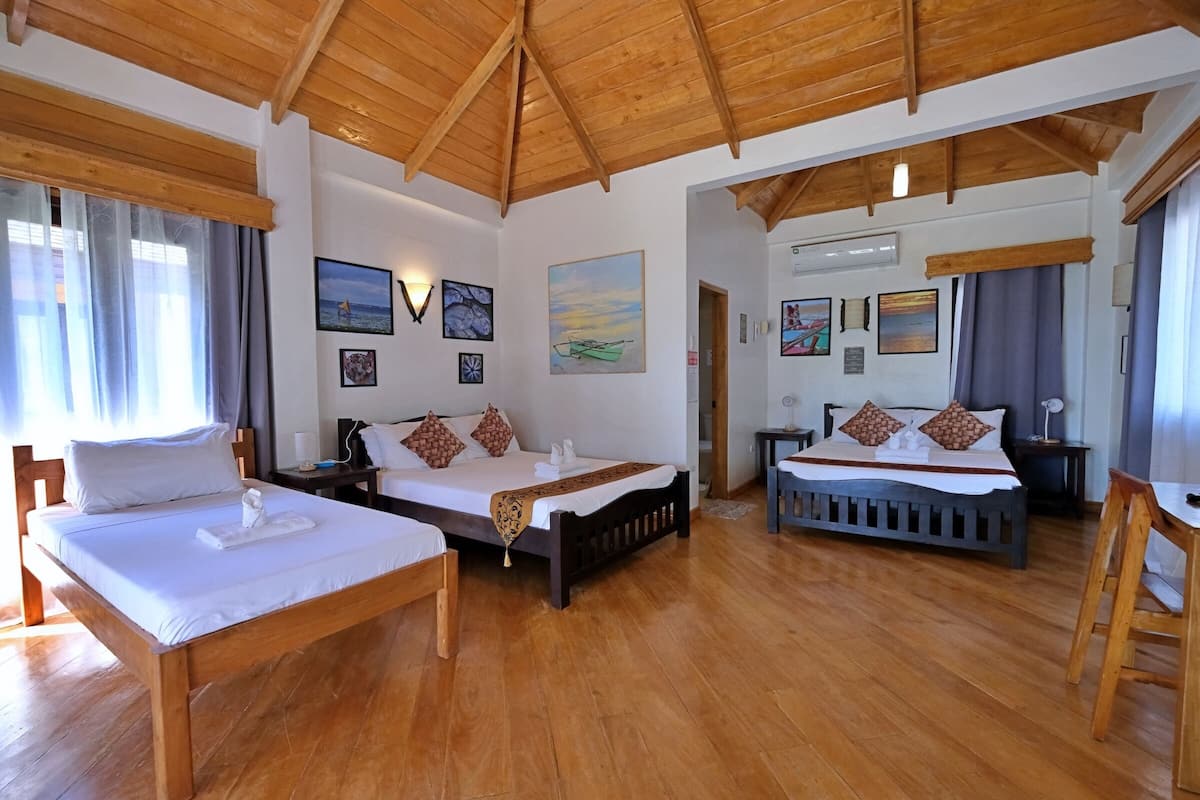 classic quadruple room | premium bedding, in-room safe, individually decorated