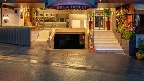 A building with a restaurant and an Orya Hotel sign. - Orya Hotel (Istanbul)