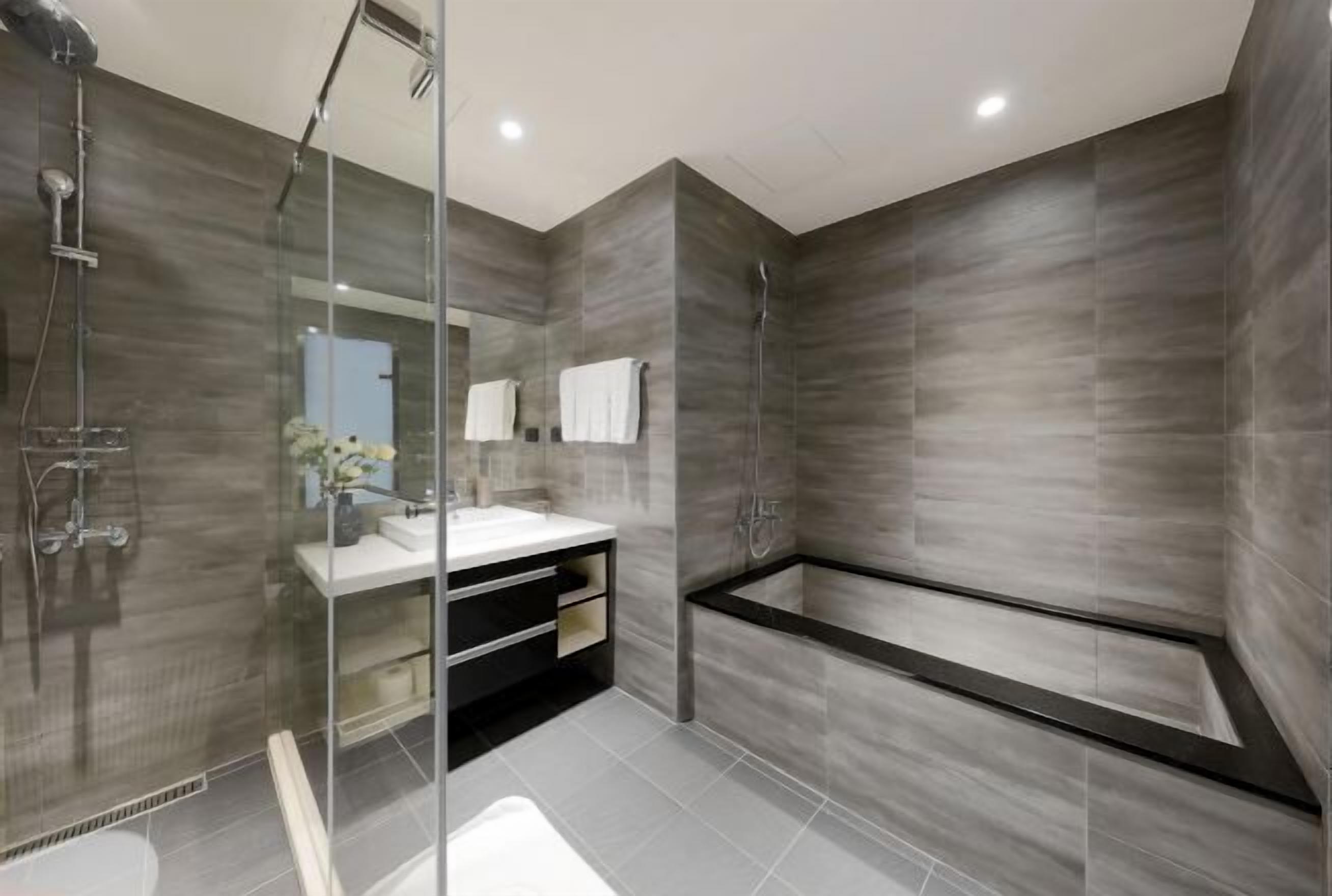 Bathroom | Hair dryer, slippers, towels