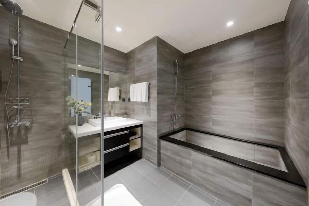 Bathroom | Hair dryer, slippers, towels