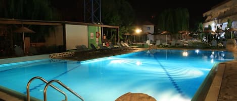 2 outdoor pools, open 9:00 AM to 9 PM, pool umbrellas, pool loungers