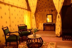 Deluxe Swiss Tent | Living area | Flat-screen TV, fireplace - Lohana Village Resort (Pushkar)
