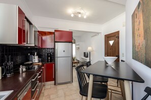 Luxury Apartment, Multiple Beds, Sea View | Private kitchen | Fridge, coffee/tea maker, electric kettle - Naxos Center Houses (Naxos)