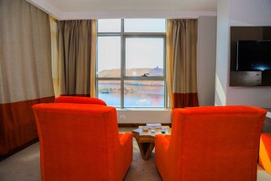 Executive Suite, 2 Bedrooms | Living area | 32-inch flat-screen TV with cable channels, TV - Aswan Plaza Hotel (Aswan)