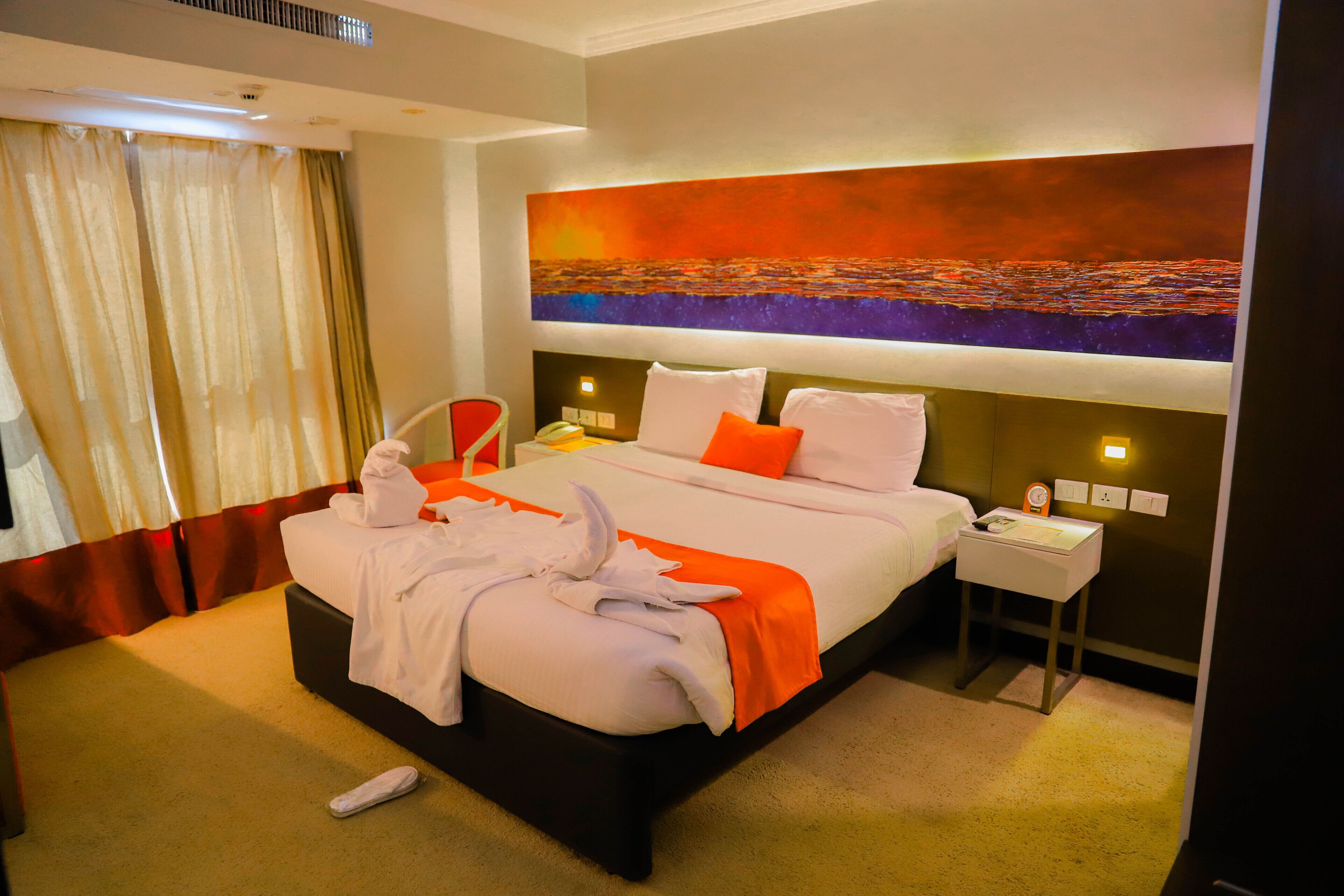 Junior Suite, 1 Bedroom, River View | 1 bedroom, minibar, in-room safe, iron/ironing board