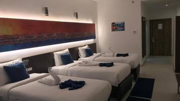 Standard Triple Room | 1 bedroom, minibar, in-room safe, iron/ironing board