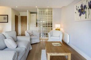 Apartment, 2 Bedrooms | Living area | Flat-screen TV