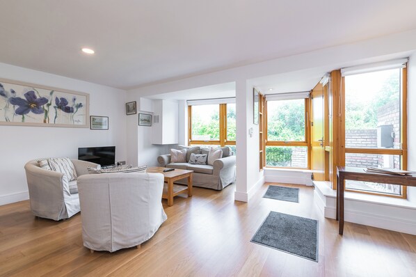 Apartment, 2 Bedrooms | Living area | Flat-screen TV