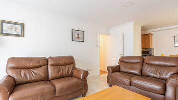 Apartment, 2 Bedrooms | Living area | TV