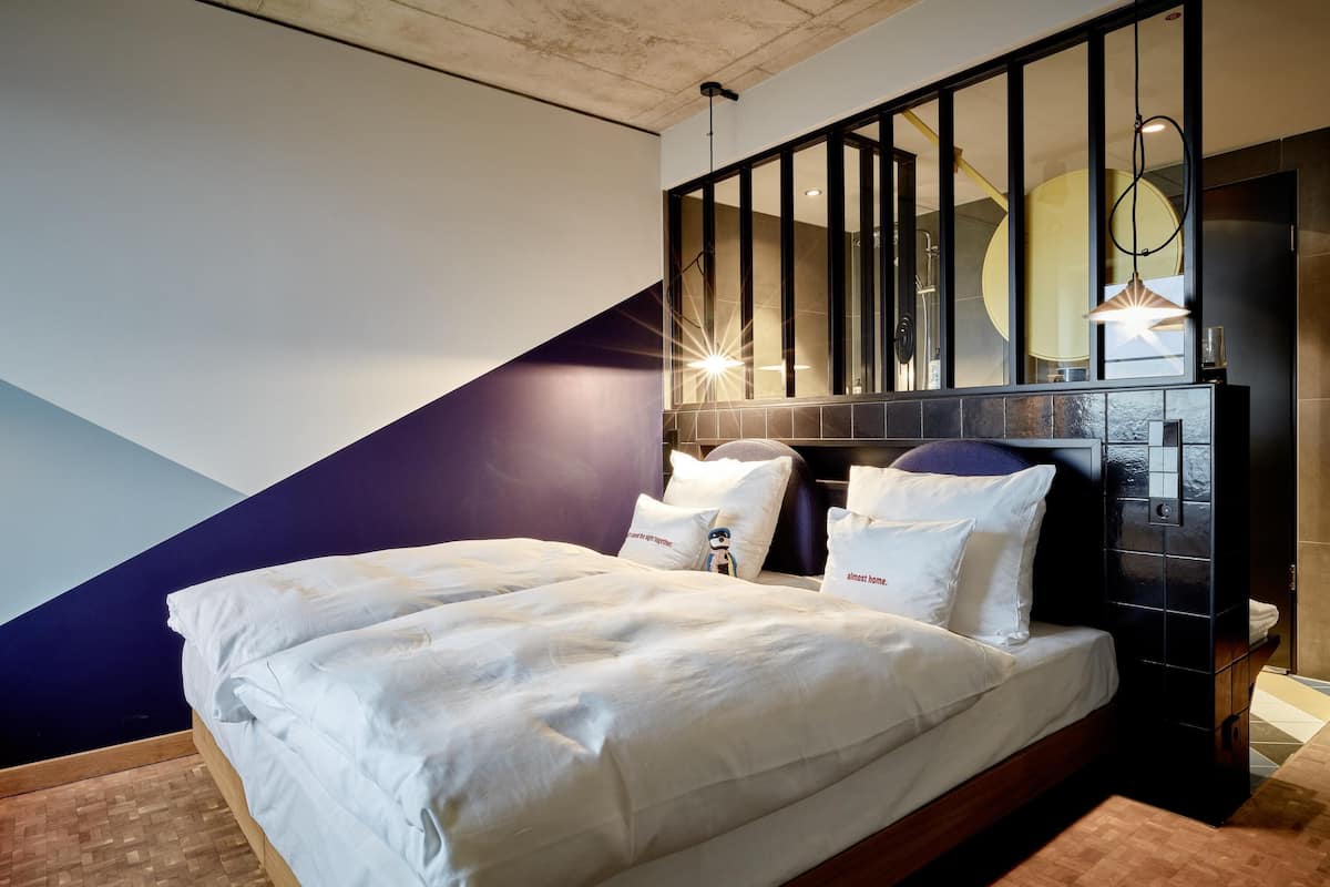 Hypo-allergenic bedding, memory-foam beds, minibar, in-room safe