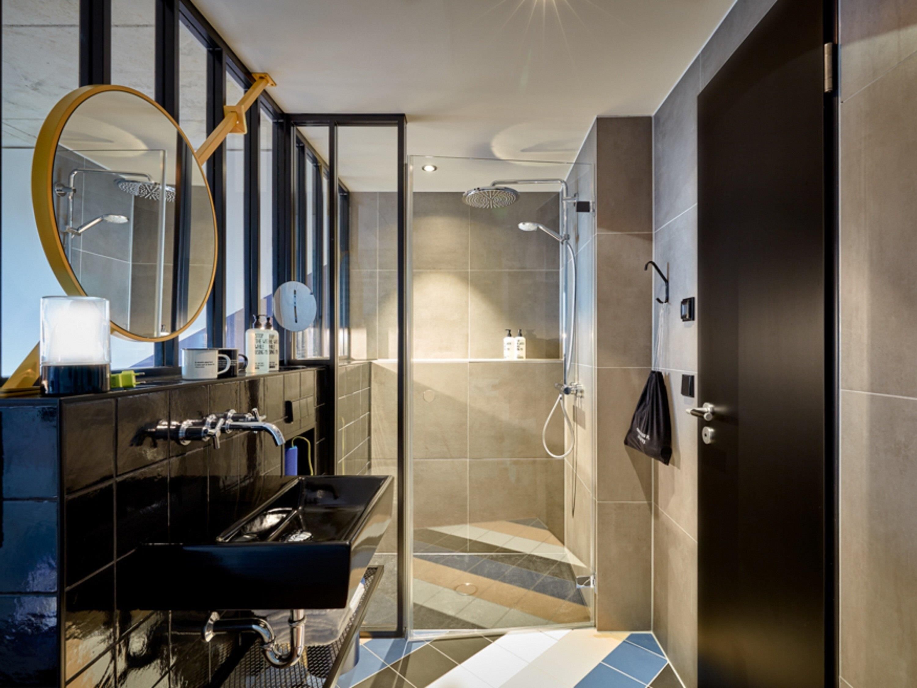 Rainfall showerhead, designer toiletries, hair dryer, towels