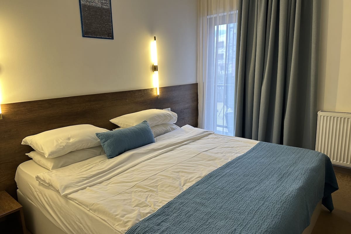 standard double room, 1 double bed, balcony, city view | 1 bedroom, premium bedding, select comfort beds, minibar