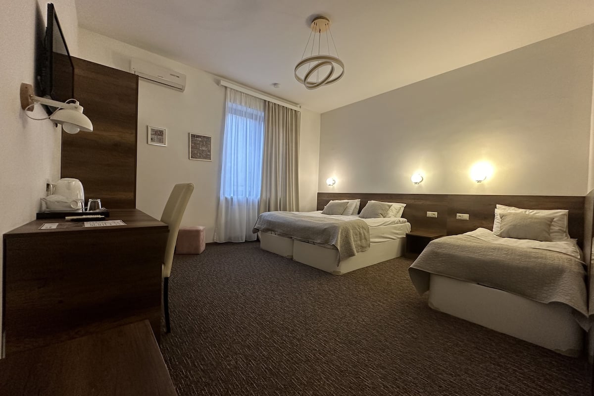 standard triple room, 3 single beds, private bathroom | 1 bedroom, premium bedding, select comfort beds, minibar