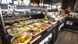 A buffet with various food items and dishes. - Honour Hotel (Nigde)