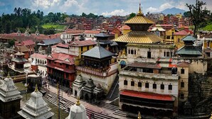 A historic town with traditional architecture, including temples and buildings with red roofs. - Thamel Trekkers Hotel (Kathmandu)