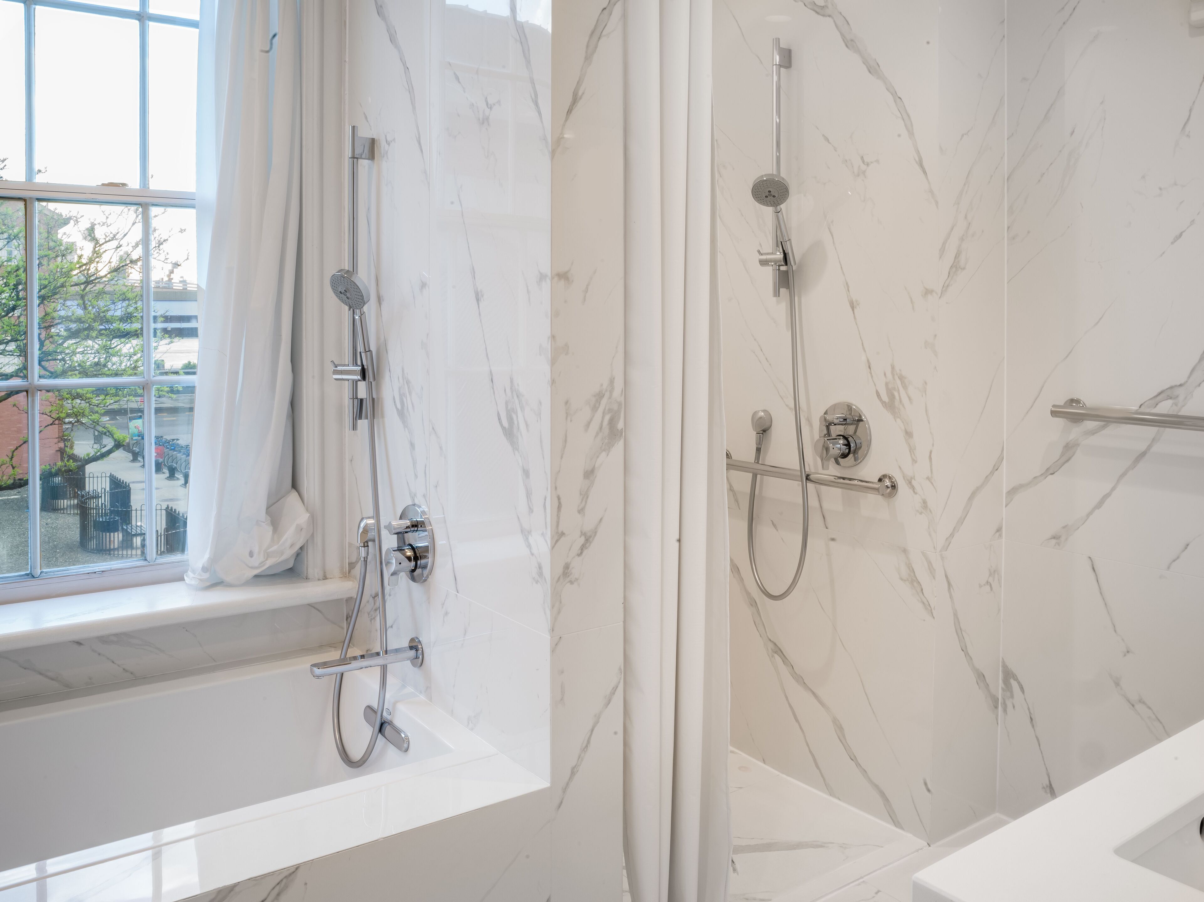 designer toiletries, hair dryer, bathrobes, slippers