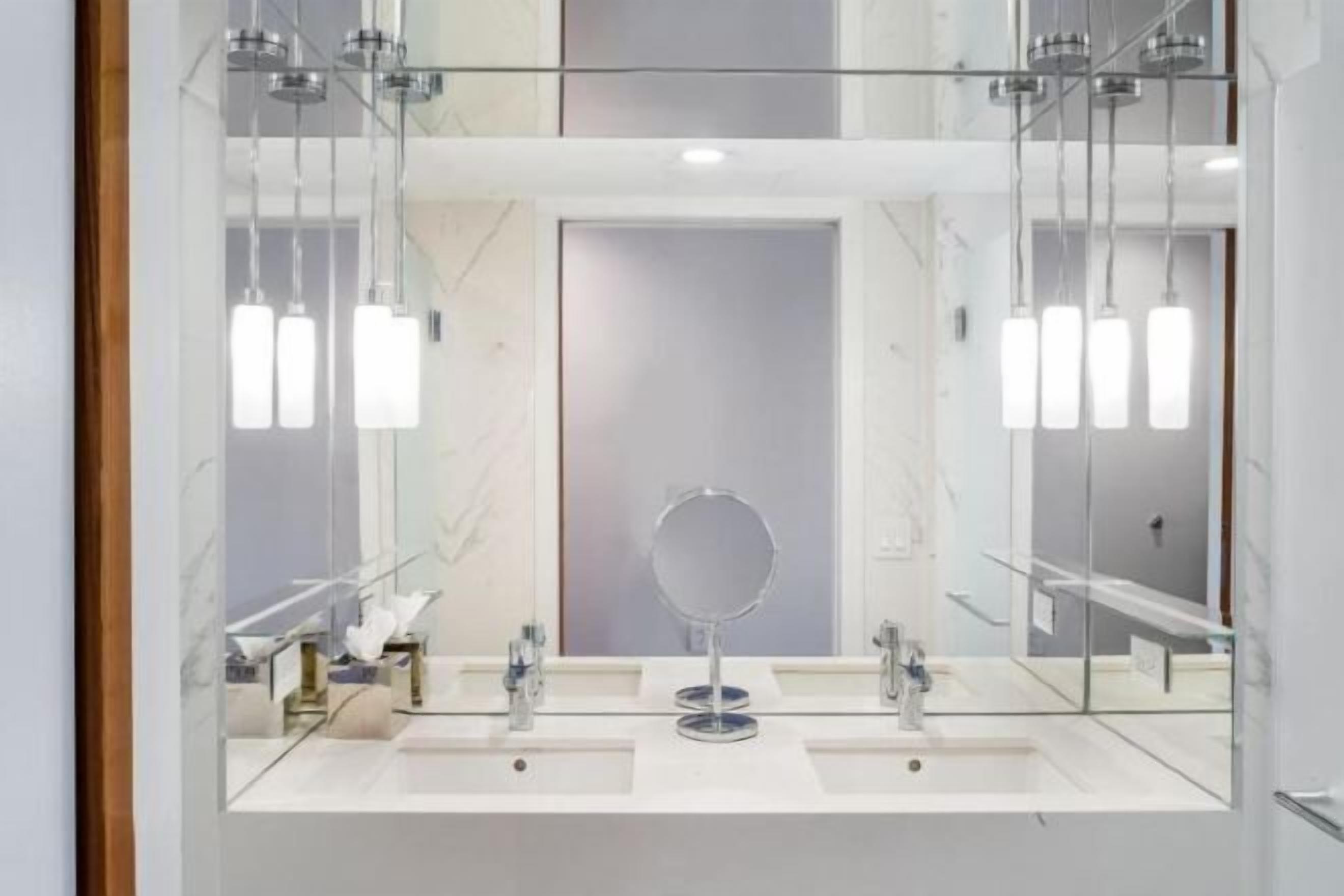 Bathroom | Designer toiletries, hair dryer, bathrobes, slippers