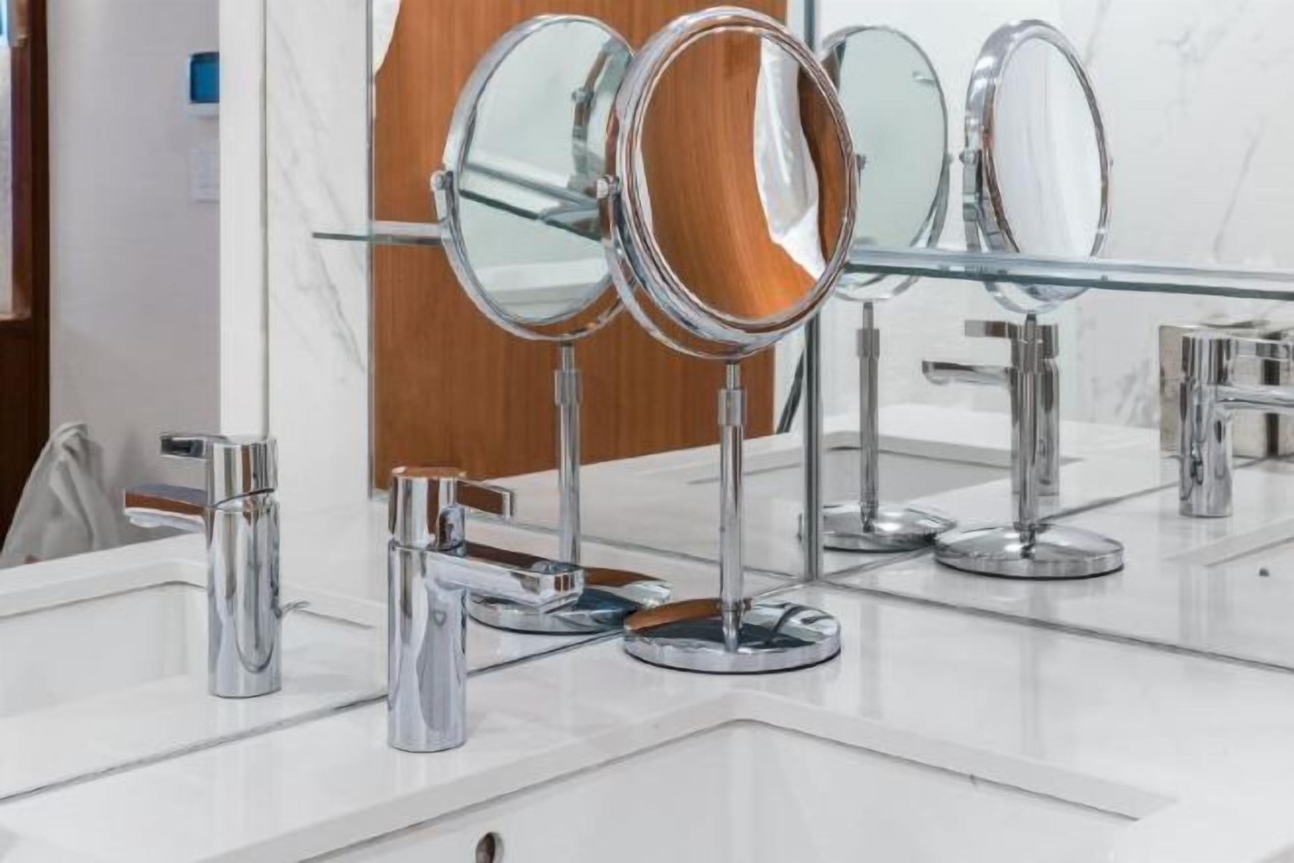 Bathroom | Designer toiletries, hair dryer, bathrobes, slippers