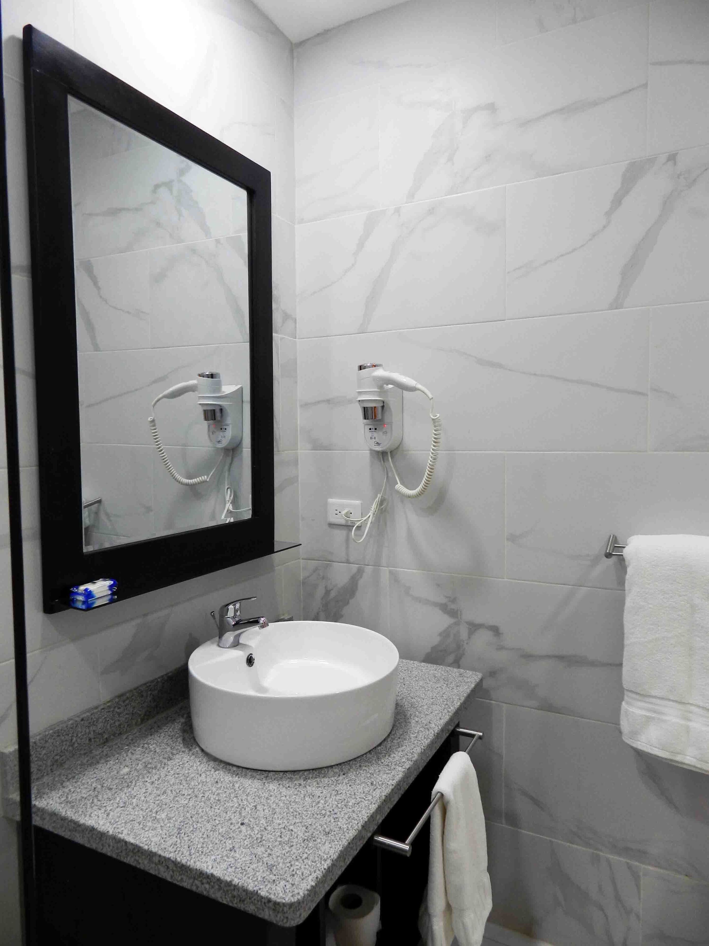 deluxe double room | bathroom | free toiletries, hair dryer, towels