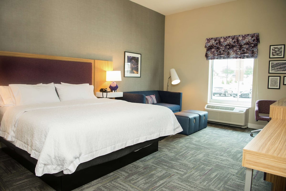 Room, 1 King Bed, Accessible, Bathtub (Mobility & Hearing) | Living area | 50-inch LCD TV with cable channels, TV
