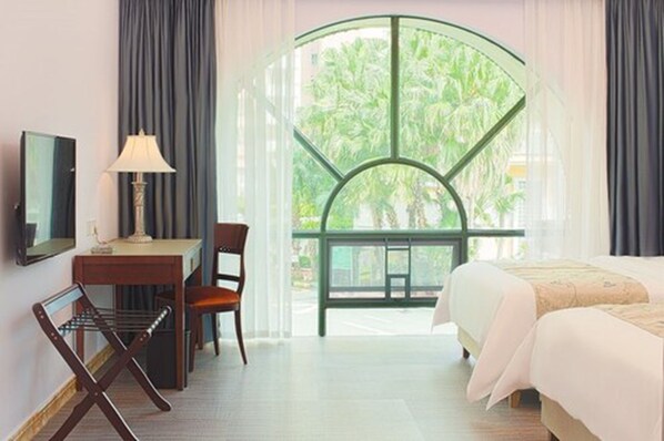 Camera Standard con 2 letti singoli | Minibar, una cassaforte in camera, una scrivania, postazione laptop