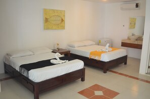 Habitación cuádruple Confort, patio, en el área del jardín | Wifi gratis 