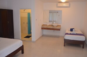 Suite superior, patio, en el área del jardín | Wifi gratis 