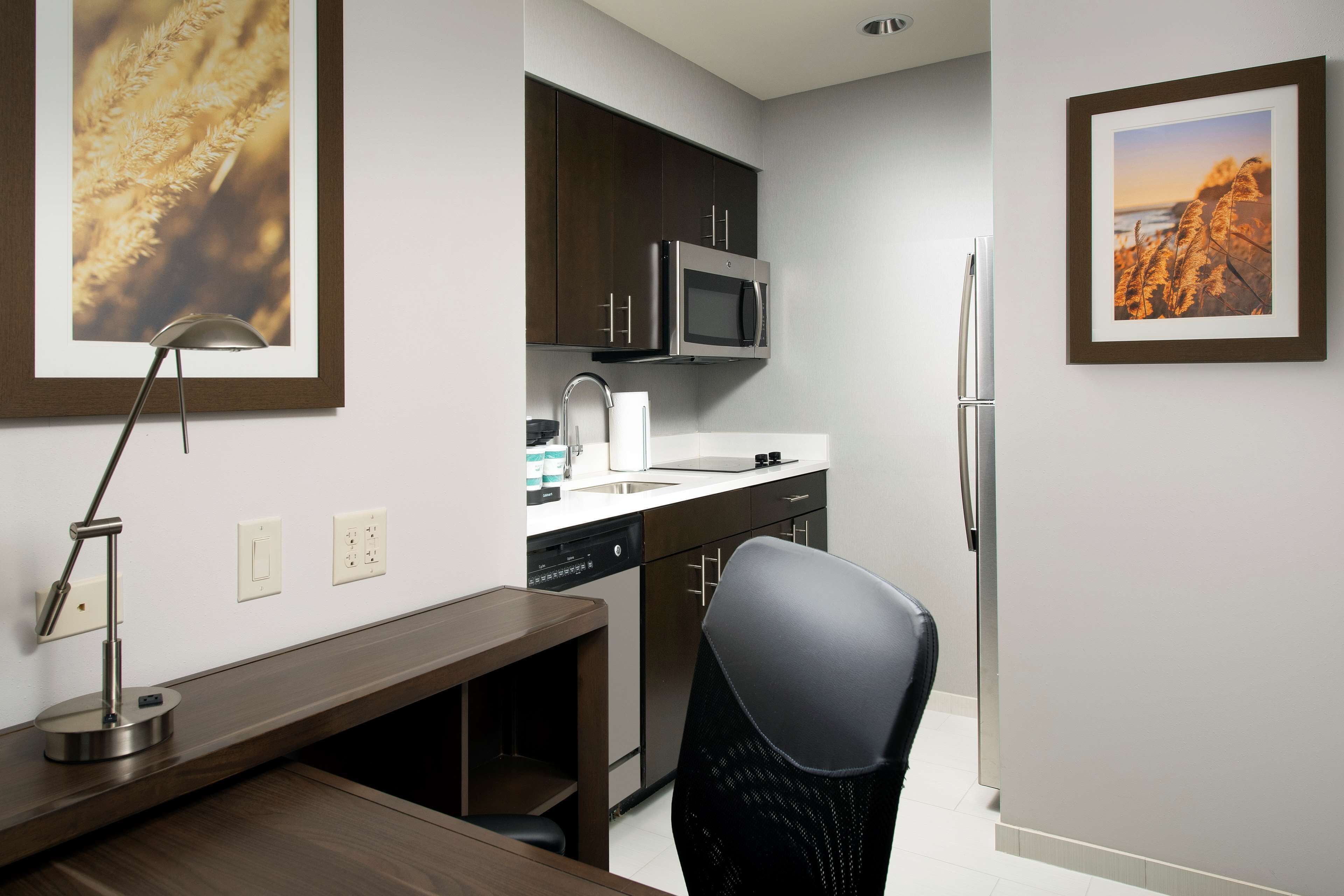 desk, laptop workspace, blackout curtains, iron/ironing board