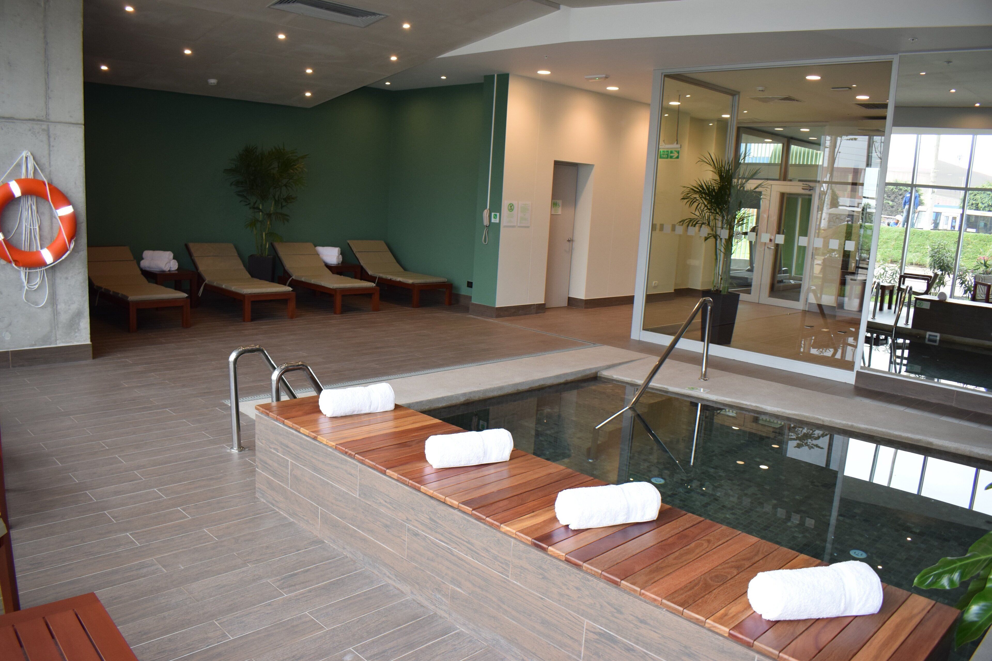 indoor pool, pool loungers