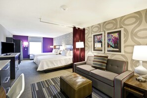 Ropa de cama de alta calidad y caja de seguridad en la habitación