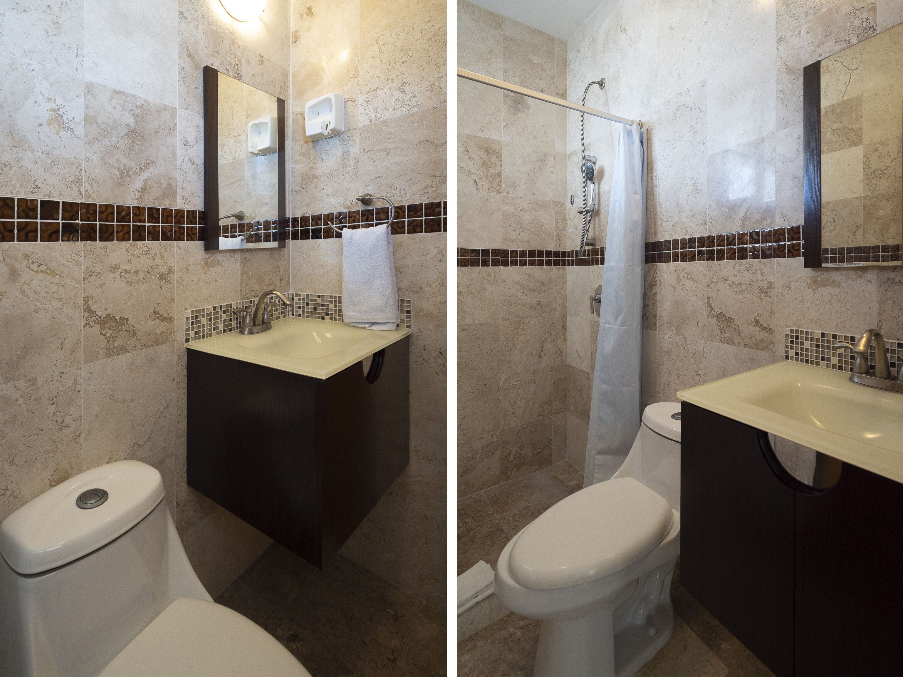 deluxe room | bathroom | shower, hair dryer, towels, soap