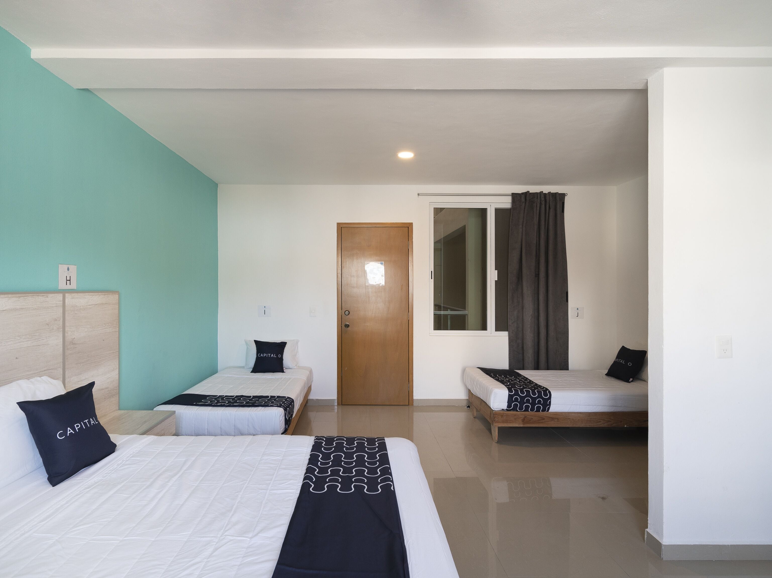 family room, multiple beds | in-room safe, blackout curtains, soundproofing, iron/ironing board