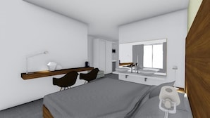 A modern bedroom with a bed, a desk, two chairs, a large mirror, and a wardrobe.