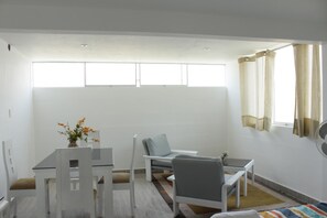 4 Executive Suite, Corner, 3 bedrooms | Living room | 42-inch TV with cable channels - Monterrico Suites Hotel (Santiago de Surco)