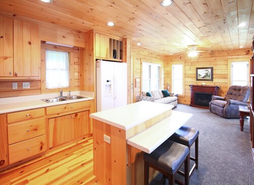 Log Cabin on Spectacular Mountain Waterfall