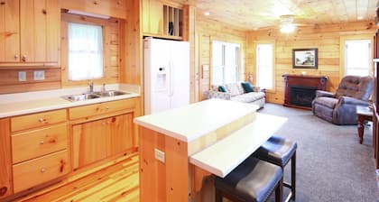 Log Cabin on Spectacular Mountain Waterfall