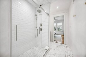 Combined shower/tub, hair dryer, towels, soap