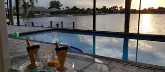 Lakefront Luxury Paradise: 80ft Waterfront, Private Pier & Heated Pool Oasis!