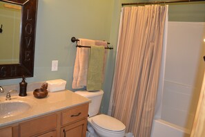 Combined shower/bathtub, hair dryer, towels, soap