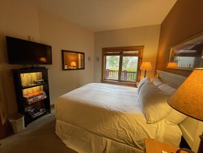 1 habitación, tabla de planchar con plancha y cuna de viaje 