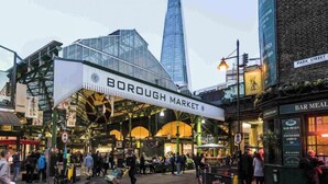 A bustling market with a prominent sign for Borough Market. -  5star central zone1 -2 bed 2 bath Slps 6 superWifi  (London)