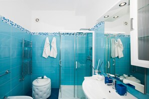 Shower, jetted tub, hair dryer, bidet