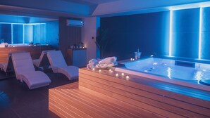 A modern spa with wooden loungers, a hot tub, and candles. - Luxury SPA Villa with Private Pool, Jacuzzi,Pine Forest - Available for Weddings (Partinico)