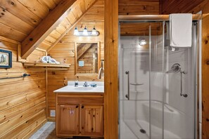 Combined shower/bathtub, hair dryer, towels, soap