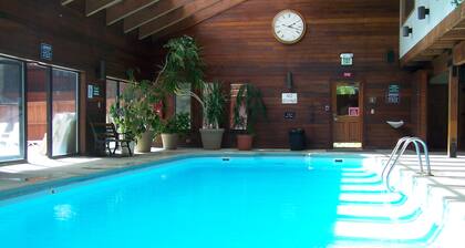 3 master suites, 2 living areas, walk to main street, hot tubs, indoor pool.