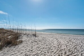 On the beach, sun-loungers, beach towels