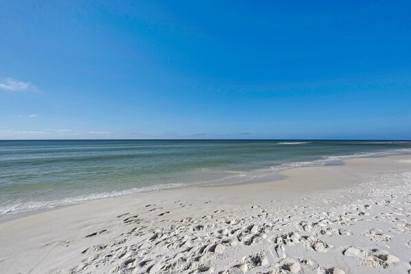 On the beach, sun-loungers, beach towels