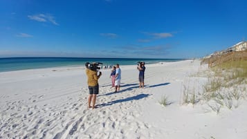 On the beach, sun-loungers, beach towels